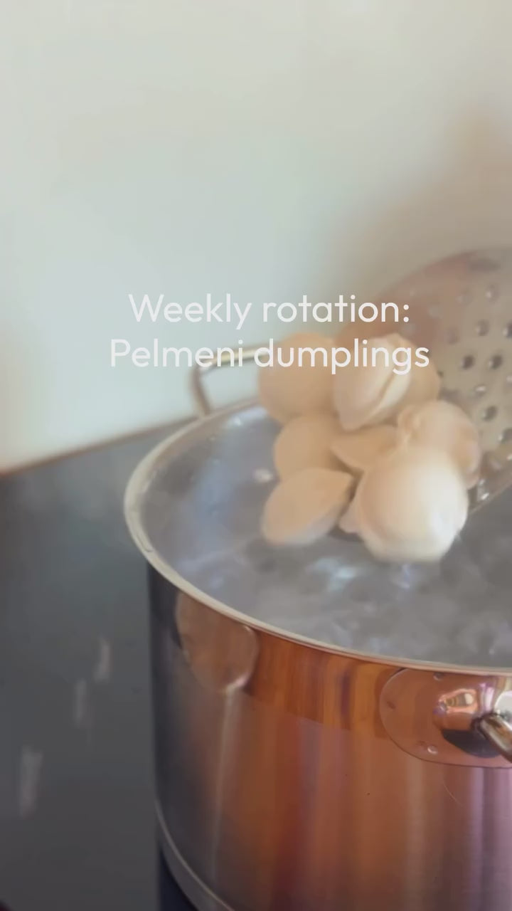 Weeknight dinner rotation: a bag of Luda's pelmeni from the freezer to the pot to the table
