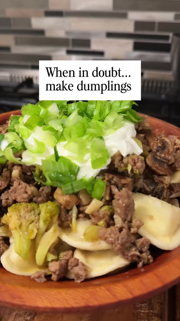 Dumpling bowl: Luda's potato vareniki topped with ground beef, mushrooms and broccoli, sour cream and scallions