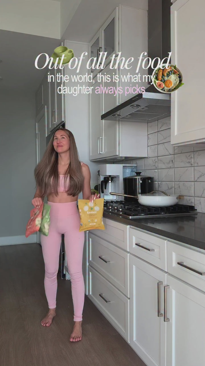 A child choosing Luda's dumplings over a hot dog for dinner